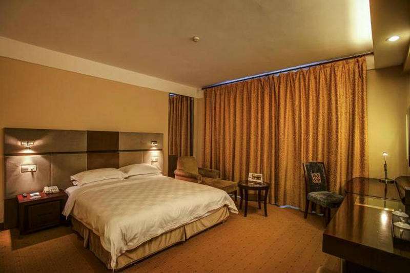 Jiangtian Hotel Quarto foto